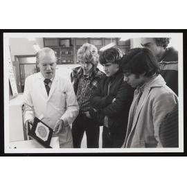 Professor Averill demonstrating a test for colour perception 