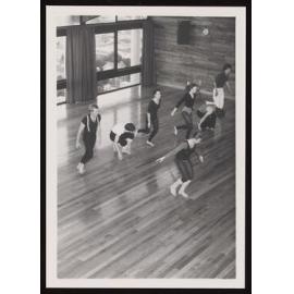 People in the dance room at the VUW Recreation Centre (a)