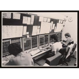 Mercia Downes, Sharon Lewis and Gary Jarvis at  telephone switchboard (a)