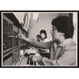 Mercia Downes, Sharon Lewis and Gary Jarvis at  telephone switchboard (b)
