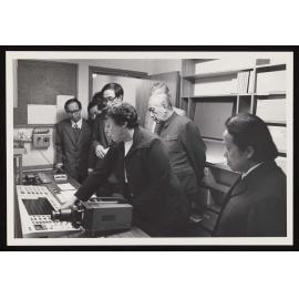 Mrs Norma Norrish, China's Ambassador Mr Qin Lizhan and Chinese embassy staff in language laboratory