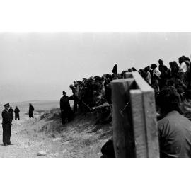 Police and demonstrators outside the Ōtehīwai Mt John observatory