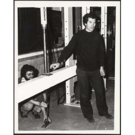 Structures lecturers John Webster and Les Meggett presenting with beam testing rig