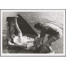 Two Architecture students testing a raft construction