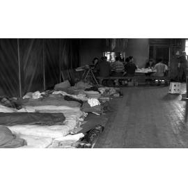 Students having kai in whare at Pāpāwai marae