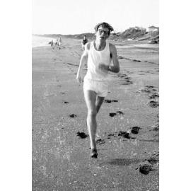 Victoria University cross country runner on beach