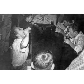 Students at Weir House in a speed drinking contest