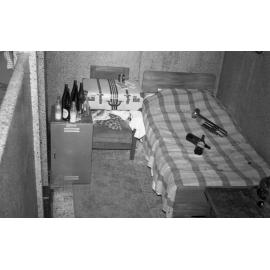 Bed and other possessions belonging to a Weir House resident inside the showers