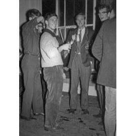 Weir House residents drinking in the social room