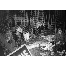 Weir House residents on floor at a flat party