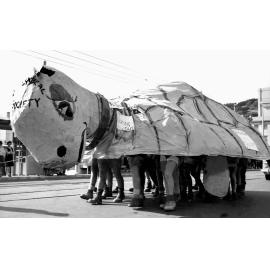Students in a tortoise costume at the annual student procession