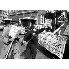Students chase float at the annual student procession through Wellington