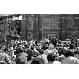 Students gathered outside the Hunter Building listening to a speaker at the weekly student forum [2]