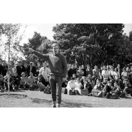 Students gathered outside listening to Roger Boshier speak at the weekly student forum