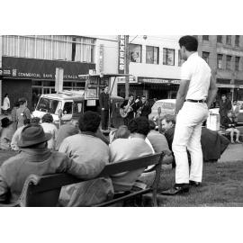 Crowd watching Sunday missionary at Te Aro Park